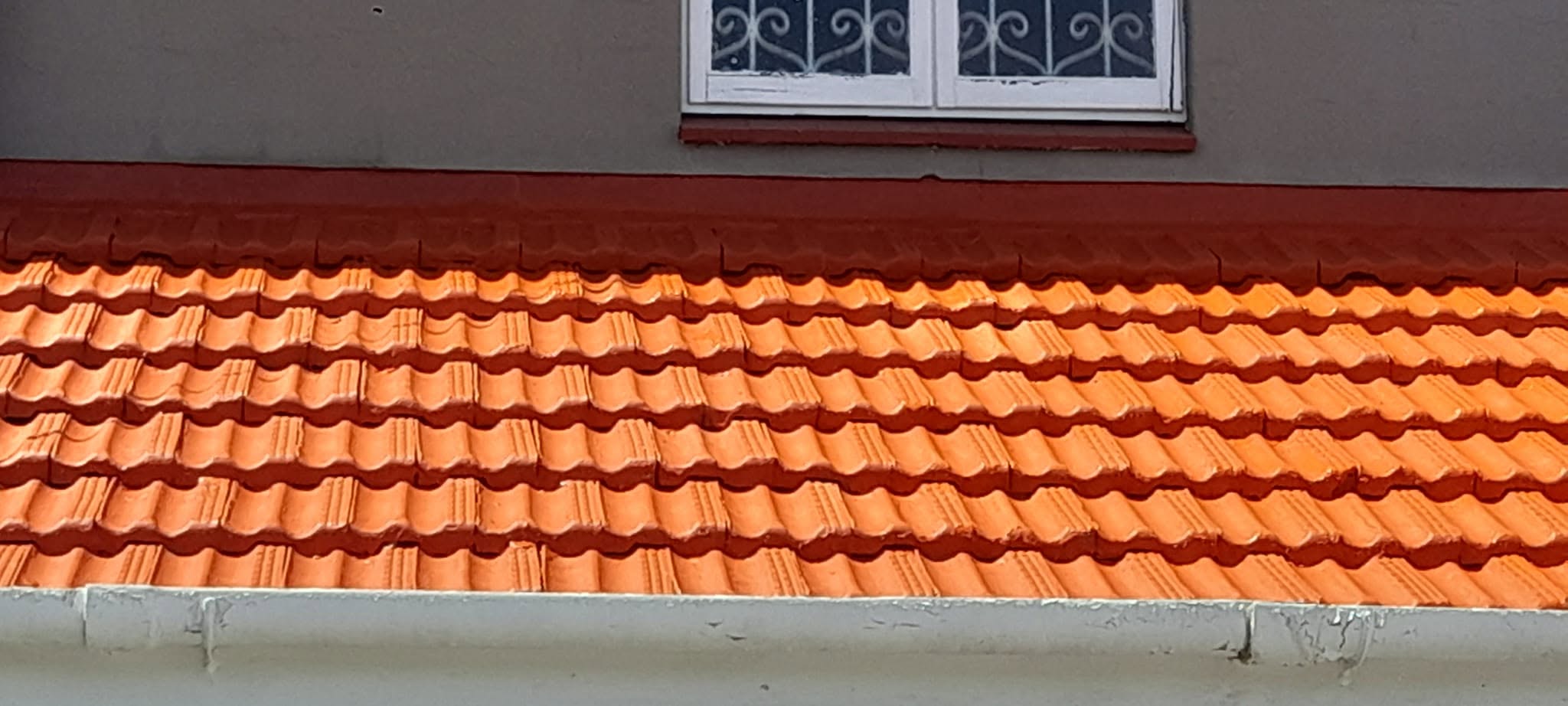 Freshly coated orange tiled roof